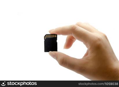 Woman hand holding a memory card isolated on a white background, with clipping path