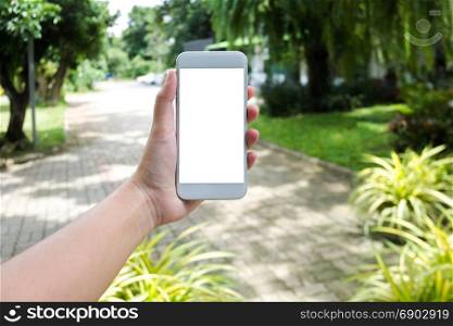 woman hand holding blank screen mobile smartphone with blurred background