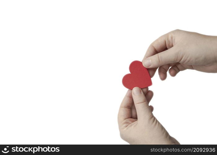 Woman Hand holding red heart isolated on white background, copy space, love,health,relationship romantic concept background space for text. Woman Hand holding red heart isolated on white background, copy space, love,health,relationship romantic concept background