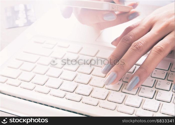 Woman hand on laptop computer, Selective focus, Online shopping concept