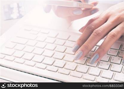 Woman hand on laptop computer, Selective focus, Online shopping concept