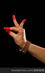 Woman hand showing Katakamukha hasta (meaning &acute;Opening in a Bracelet&acute;) of indian classic dance Bharata Natyam