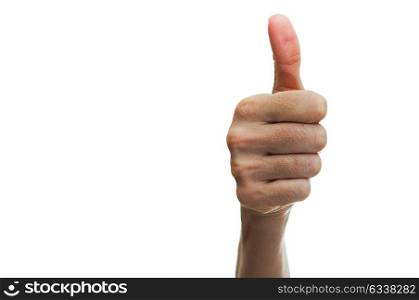 Woman hand showing thumb up sign isolated on white background