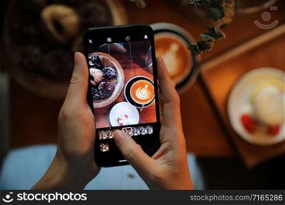Woman Hand Taking Photo Food by Mobile Phone