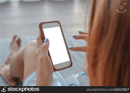 woman hand using a smart phone with blank screen. woman hand smartphone