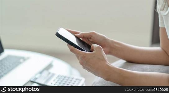 Woman hand using smartphone for checking social media or  woman reading ebook on screen