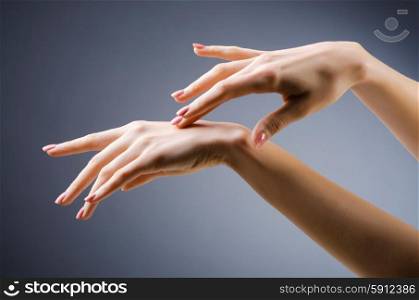 Woman hands against gradient background
