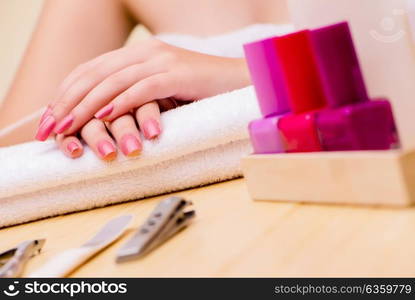 Woman hands during manicure procedure