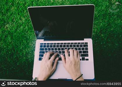 woman hands on a laptop