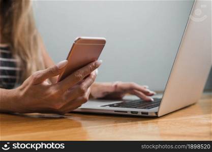 woman hands using phone laptop. Resolution and high quality beautiful photo. woman hands using phone laptop. High quality beautiful photo concept