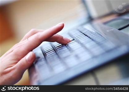 woman hands working on keyboard
