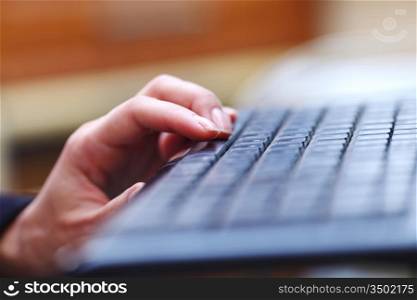 woman hands working on keyboard