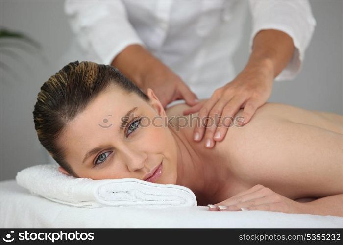 Woman having a back massage