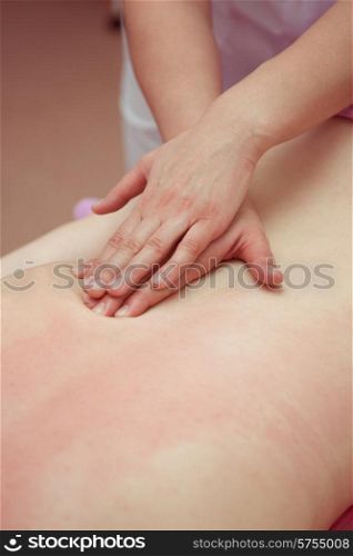 Woman having a massage at spa. massage
