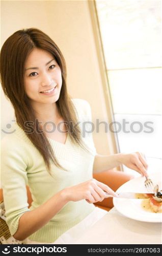 Woman having a meal at a restaurant