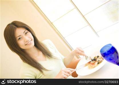 Woman having a meal at a restaurant