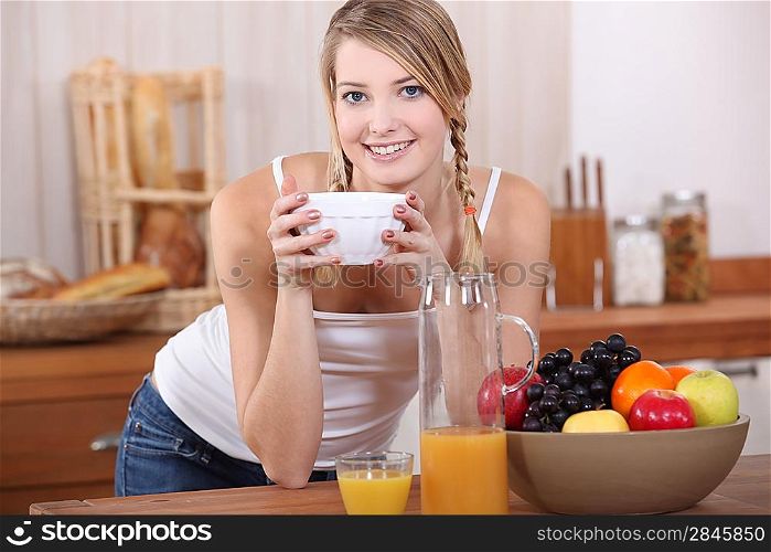Woman having breakfast.