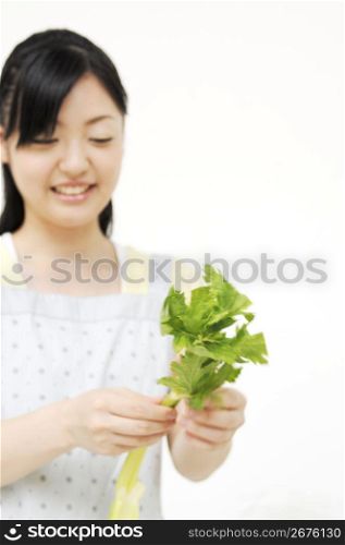 Woman having celery