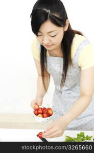 Woman having cherries