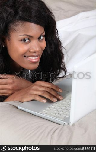 woman having fun with her laptop