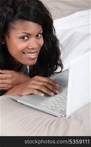 woman having fun with her laptop