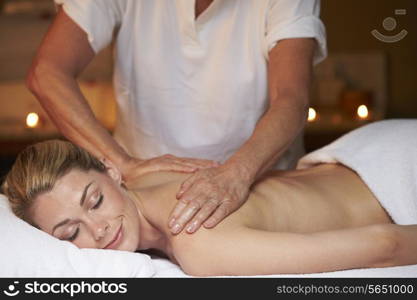 Woman Having Massage In Spa