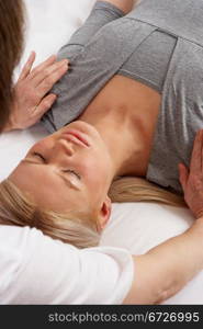 Woman having Shiatsu massage