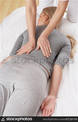 Woman having Shiatsu massage