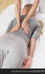 Woman having Shiatsu massage