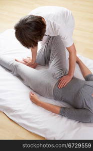 Woman having Shiatsu massage