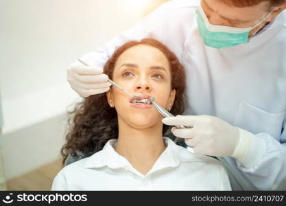 Woman having teeth examined at dentists,Overview of dental caries prevention,Medicine,Stomatology and health care concept.