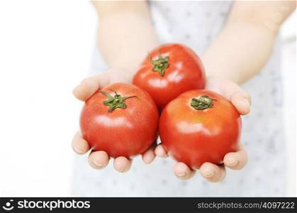 Woman having tomatoes