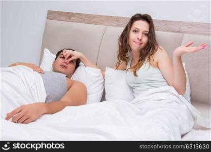 Woman having trouble with husband snoring