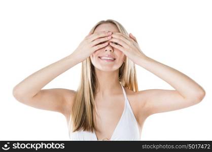 Woman hiding her eyes with hands and smiling isolated on white background
