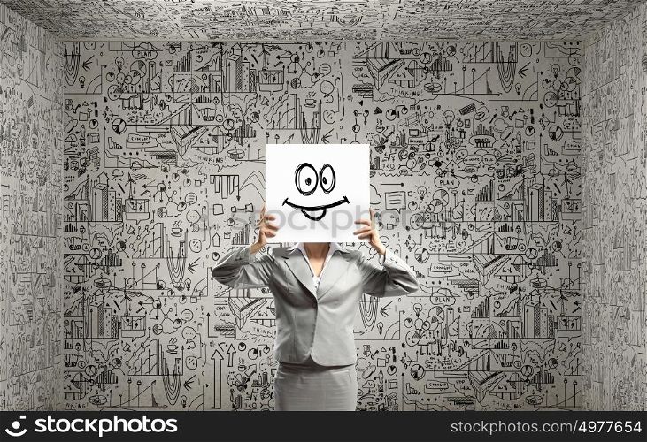 Woman hiding her face. Businesswoman hiding her face behind paper list