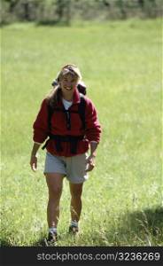 Woman Hiking and Smiling