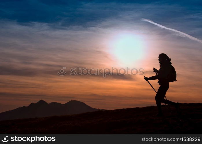 Woman Hiking in the Mountains at Sunset Outdoor Adventure Active Lifestyle
