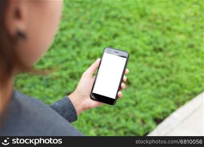 woman hold phone mobile showing blank screen outdoor lifestyle, third person perspective view
