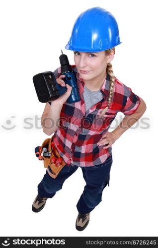 Woman holding a cordless drill