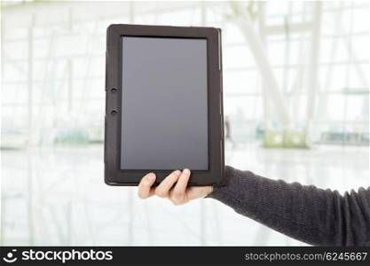 Woman holding a digital tablet at the office