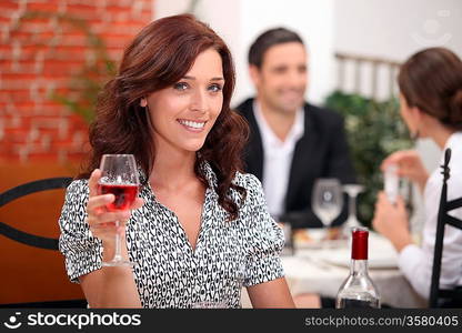 Woman holding a glass of wine