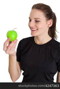 Woman Holding A Green Apple And Smiling