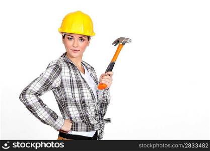 Woman holding a hammer.