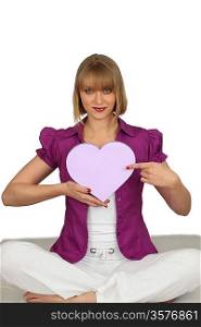 Woman holding a heart-shaped box