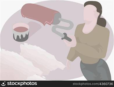 Woman holding a paint roller