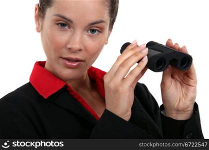 Woman holding a pair of binoculars