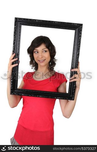 Woman holding a picture frame