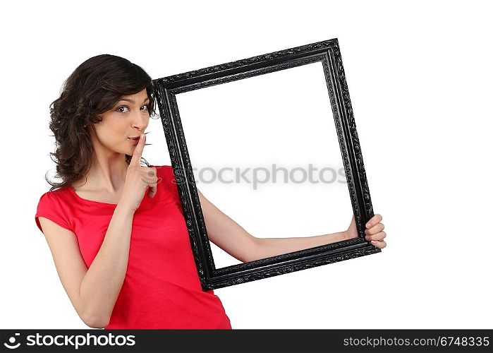 woman holding a picture frame