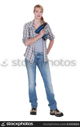 Woman holding a power tool