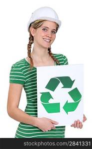 Woman holding a recycling label